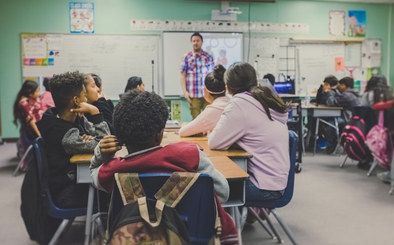 Teacher taking attendance in a classroom